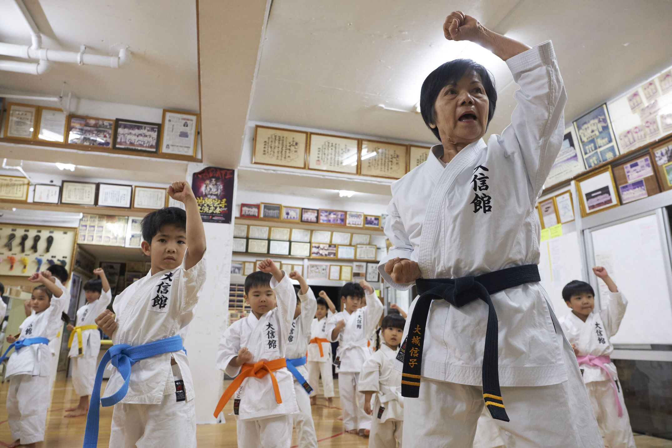 Okinawa is the origin of Karate, the martial art of „empty hands“. Portraits of grandmasters and the island. Nowadays it is practised all over the world.