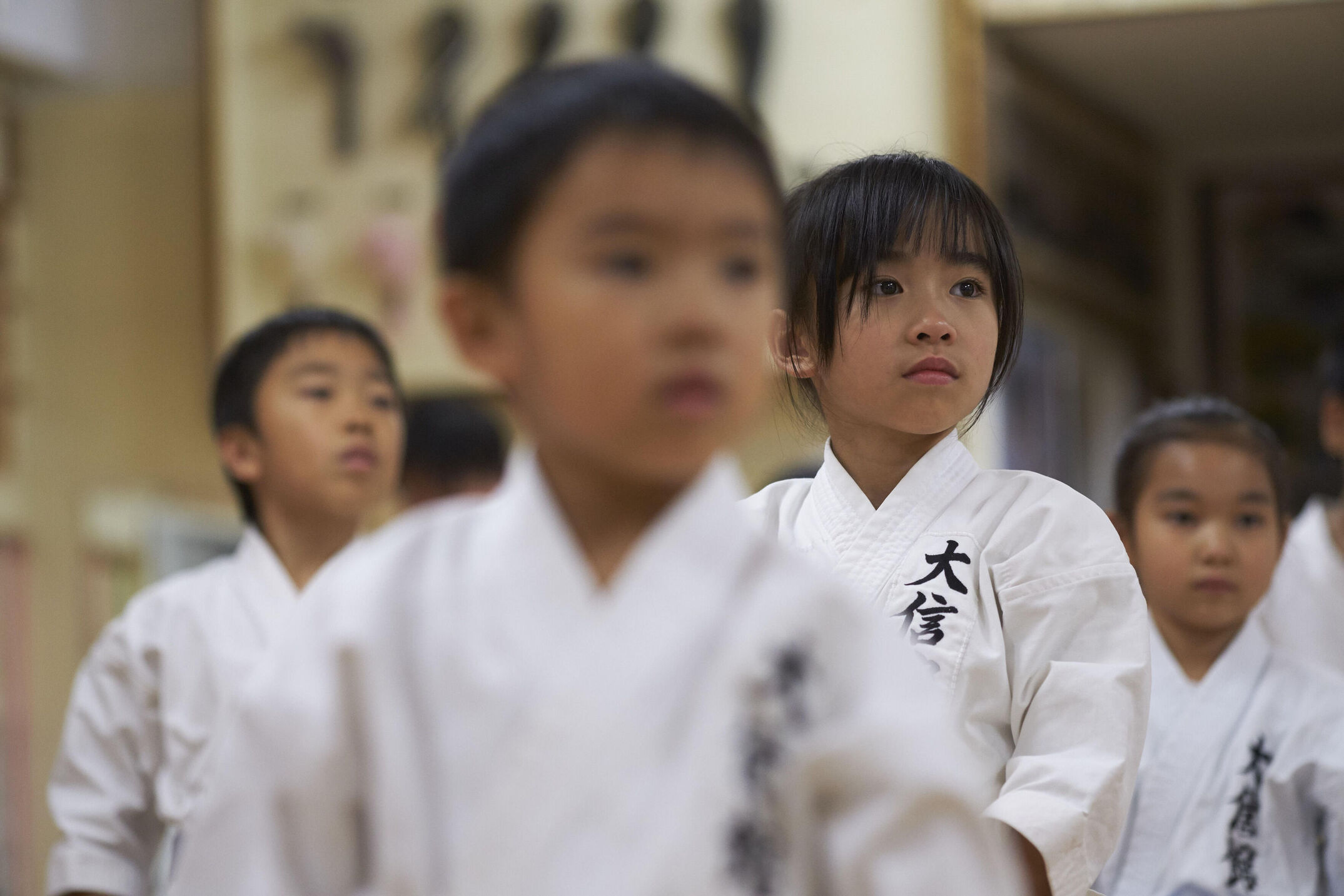 Okinawa is the origin of Karate, the martial art of „empty hands“. Portraits of grandmasters and the island. Nowadays it is practised all over the world.