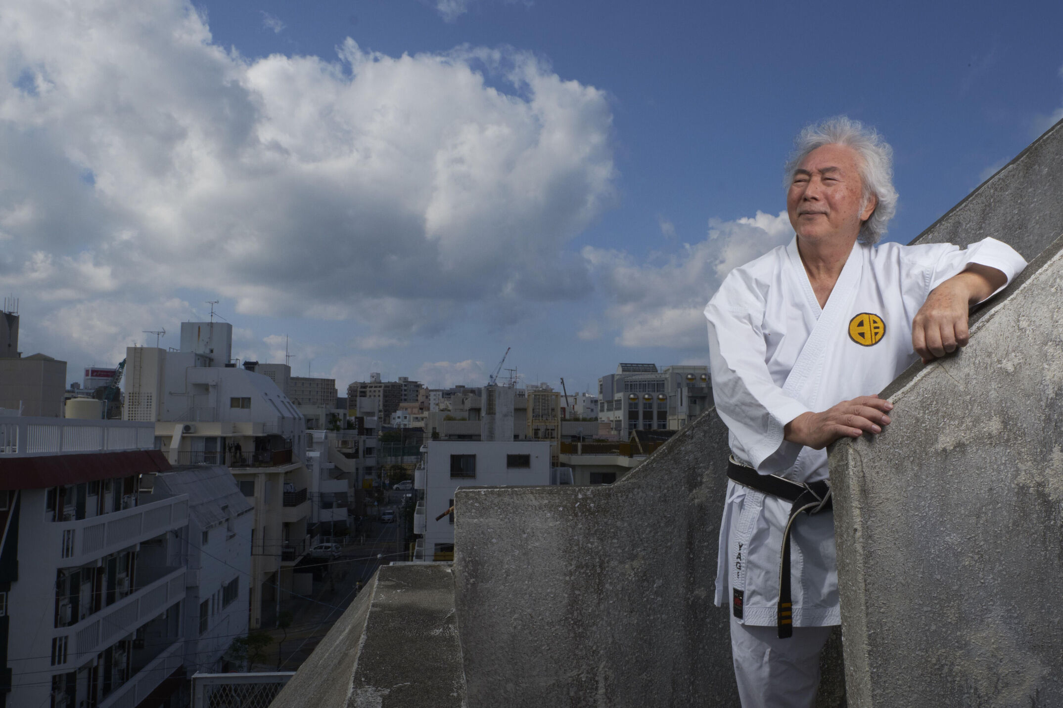 Okinawa is the origin of Karate, the martial art of „empty hands“. Portraits of grandmasters and the island. Nowadays it is practised all over the world.